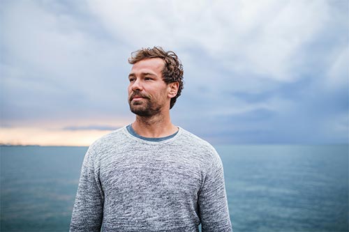 man learning about insurance and paying for treatment at next step recovery